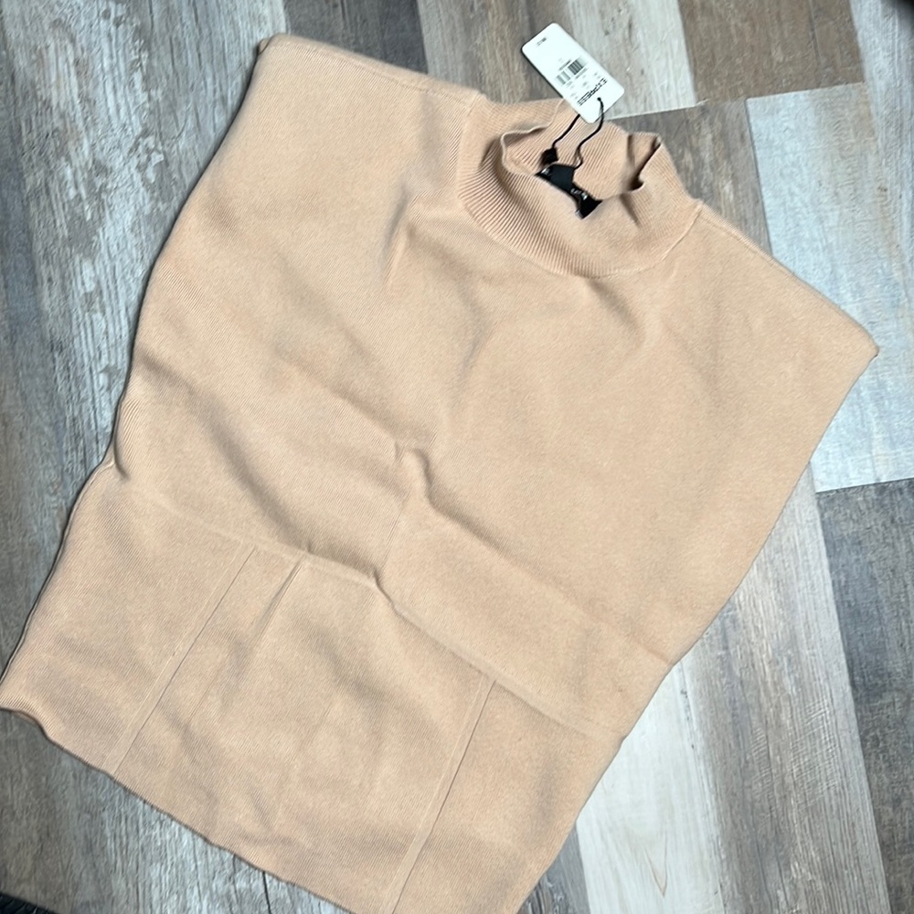 top is mock neck/ shoulder pads.skirt is a midi skirt. Top (Large) Skirt (Small)